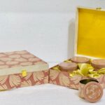 Elegant gift hampers box in peach tones featuring 4 jars, ideal for wedding favors and stylish gifts.